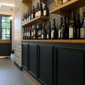 présentation de bouteilles de vin pour fromagerie